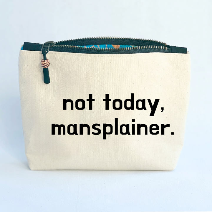 square linen-color canvas zip bag with a black zipper and the words, not today, mansplainer.