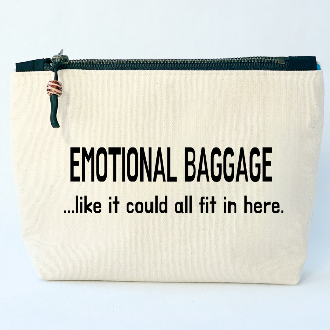 square linen-color canvas zip bag with black zipper and the words, emotional baggage...like it could all fit in here.