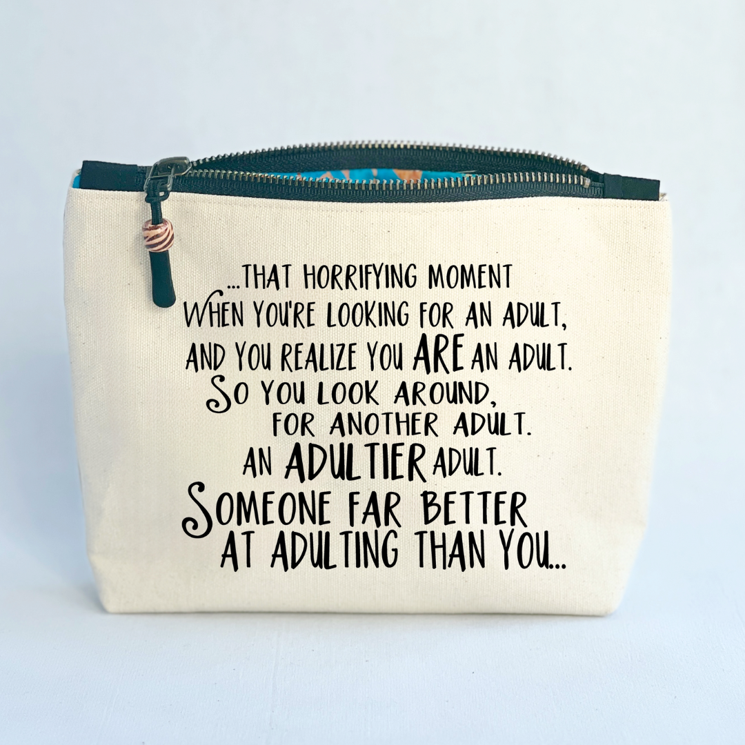 square canvas zip bag with black zipper and the words, that horrifying moment when you realize that you are the adult in the room