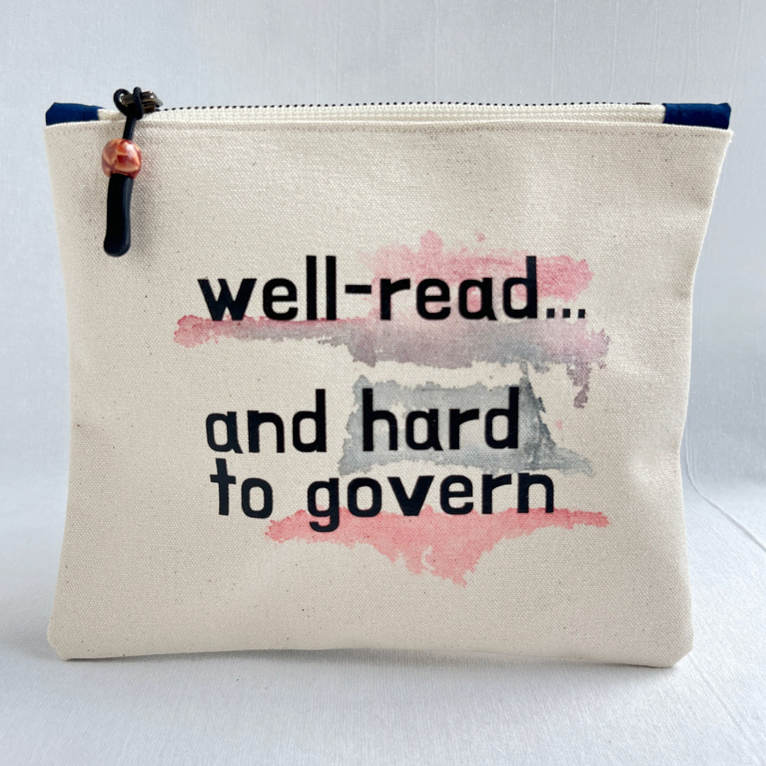 A canvas zippered pouch with the text 'well-read.