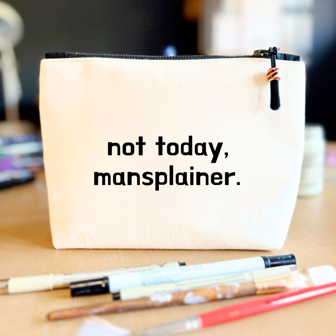 square linen-color canvas zip bag with a black zipper and the words, not today, mansplainer.