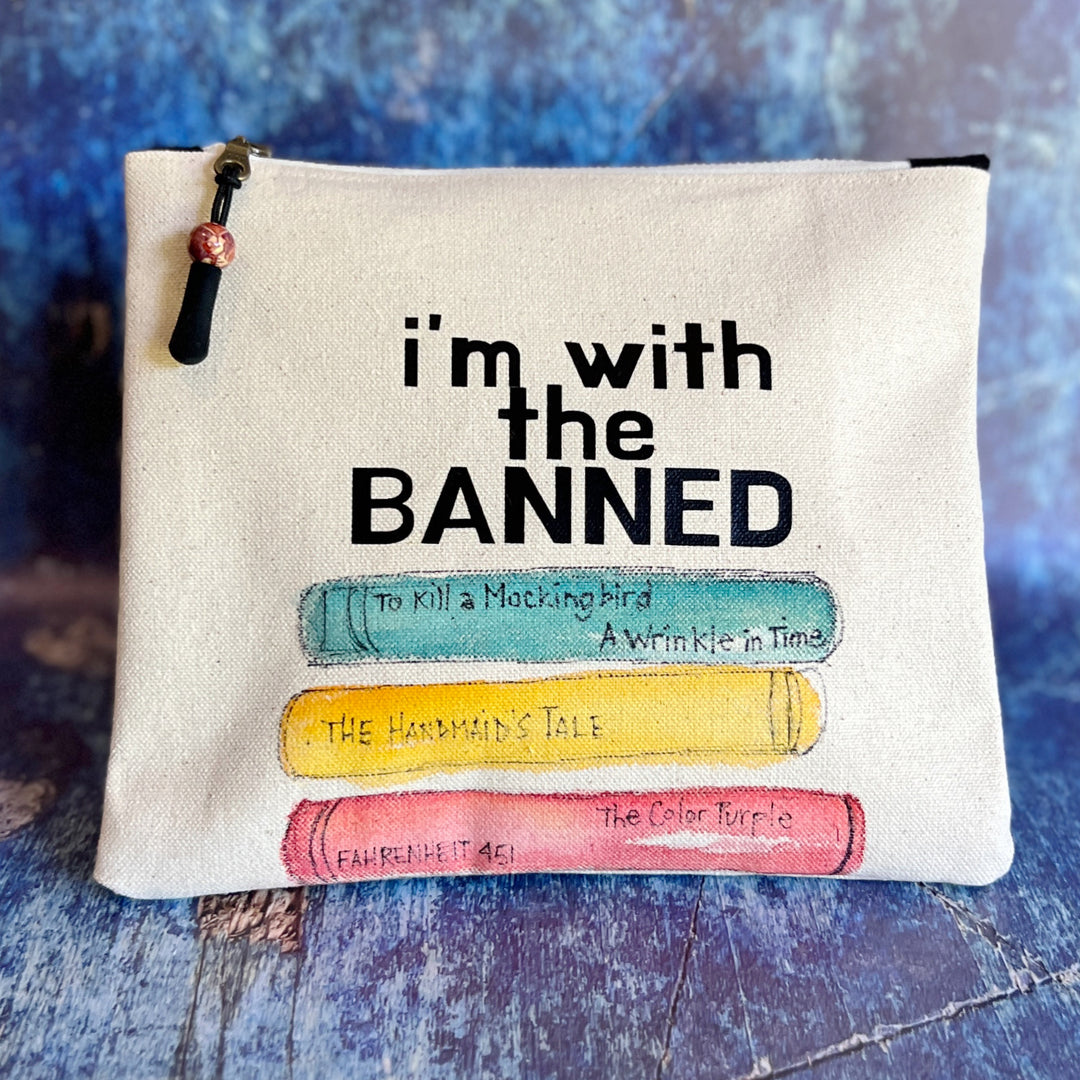 square canvas bag with painted books and the words, I'm with the Banned