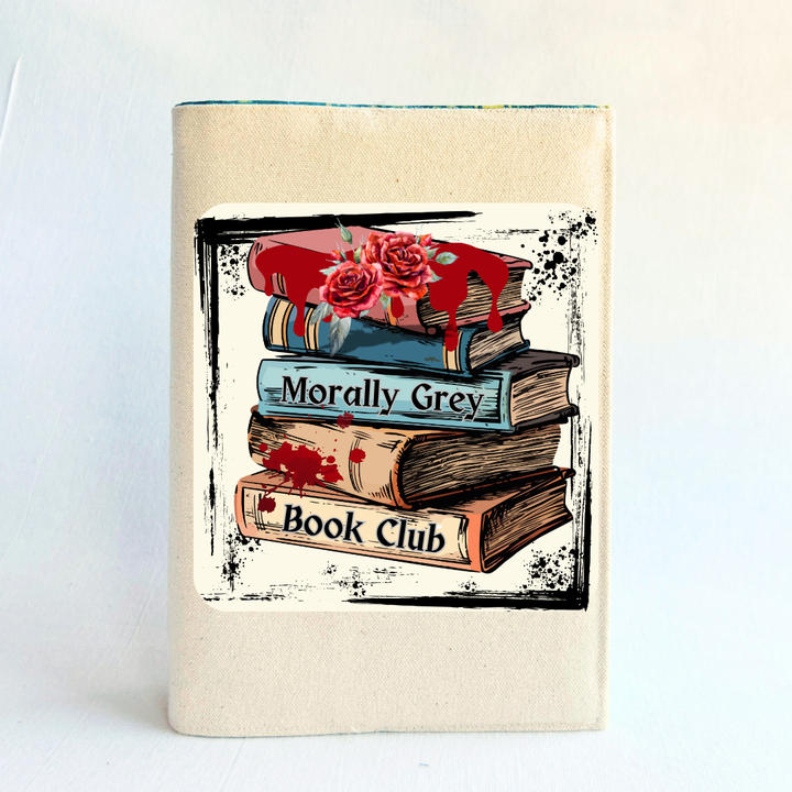 canvas reusable book cover with an original design of a book stack with blood splatters and black marks, plus the words, Morally Grey Book Club along the spines of the book stack.