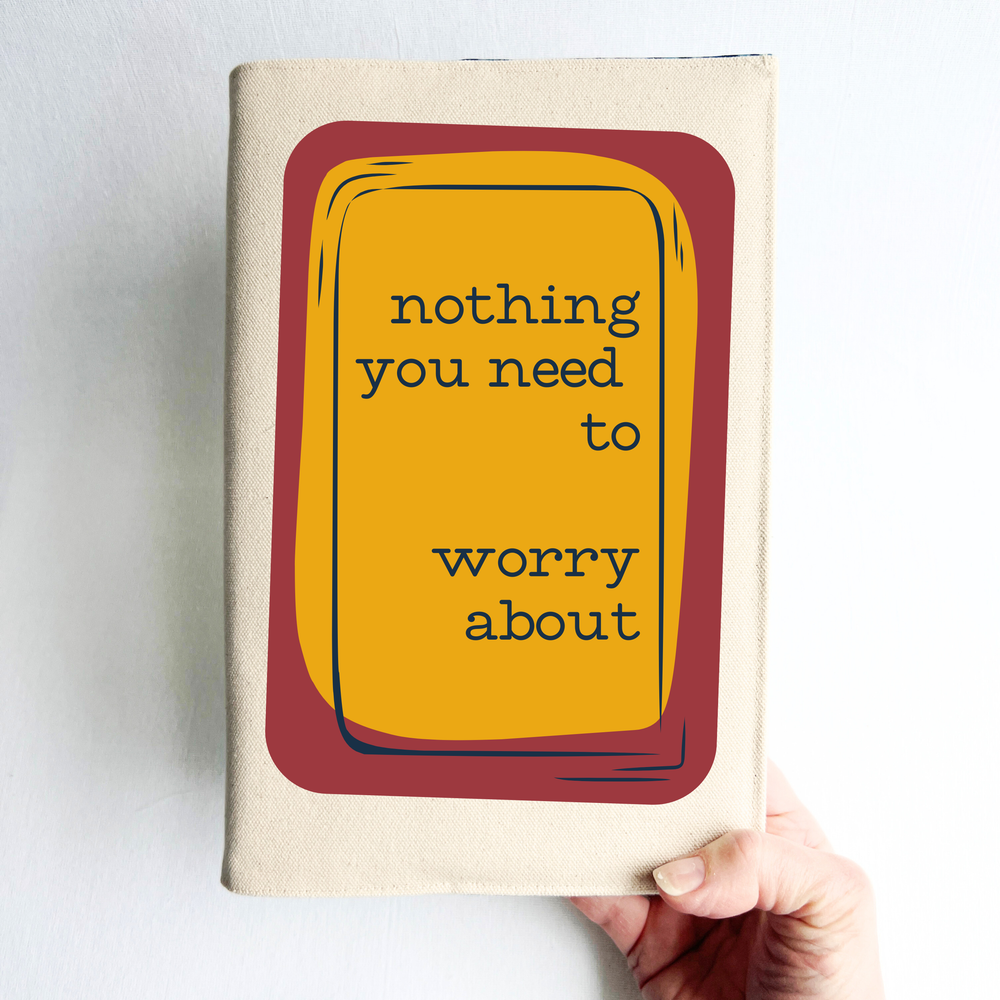 A linen-colored canvas book cover featuring a central graphic of a mustard yellow rounded rectangle with a dark red border and the text 'nothing you need to worry about' in black lettering.