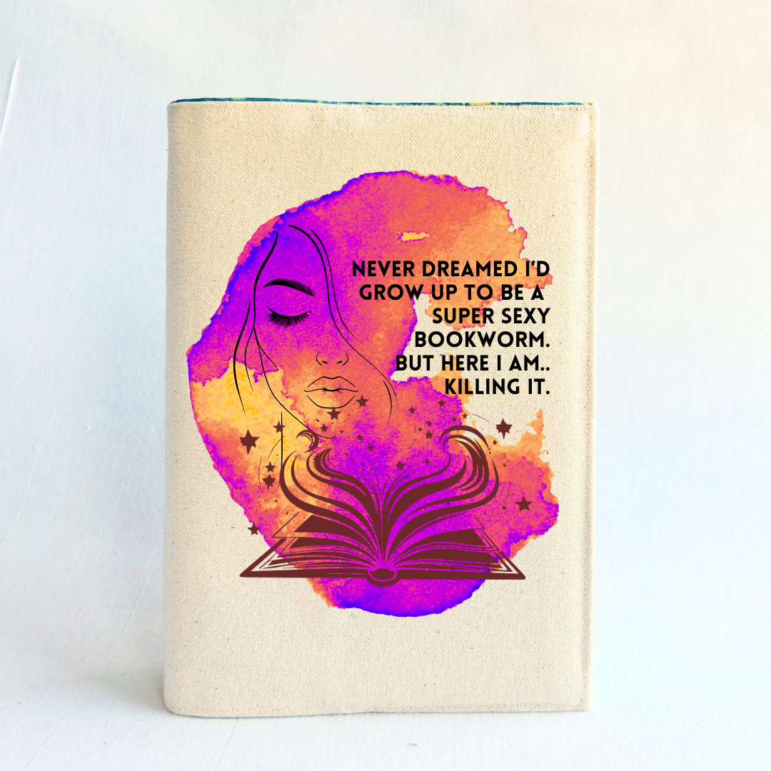 a book covered with a linen-colored canvas with a vibrant violet golden orange watercolor swash, featuring the outline of a face with long lashes and lush lips, an open book with stars and flourishes, and the words, 'never dreamed I'd grow up to be a super sexy bookworm. but here I am, killing it.' 