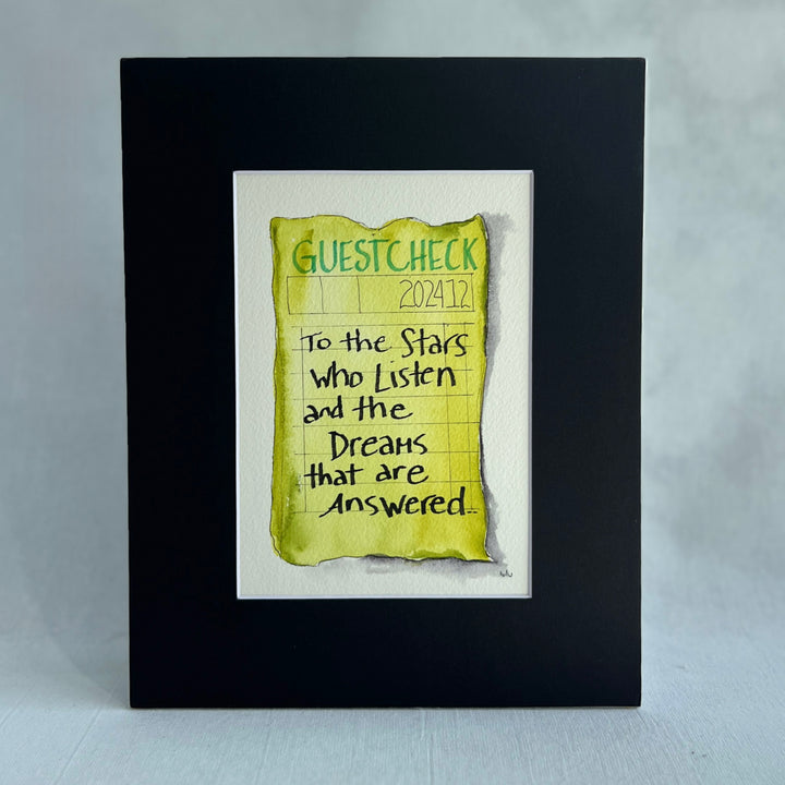 an original watercolor painting in shades of green-yellow, depicting a vintage crumpled diner guest check with the words, to the stars who listen and the dreams that are answered, matted in black