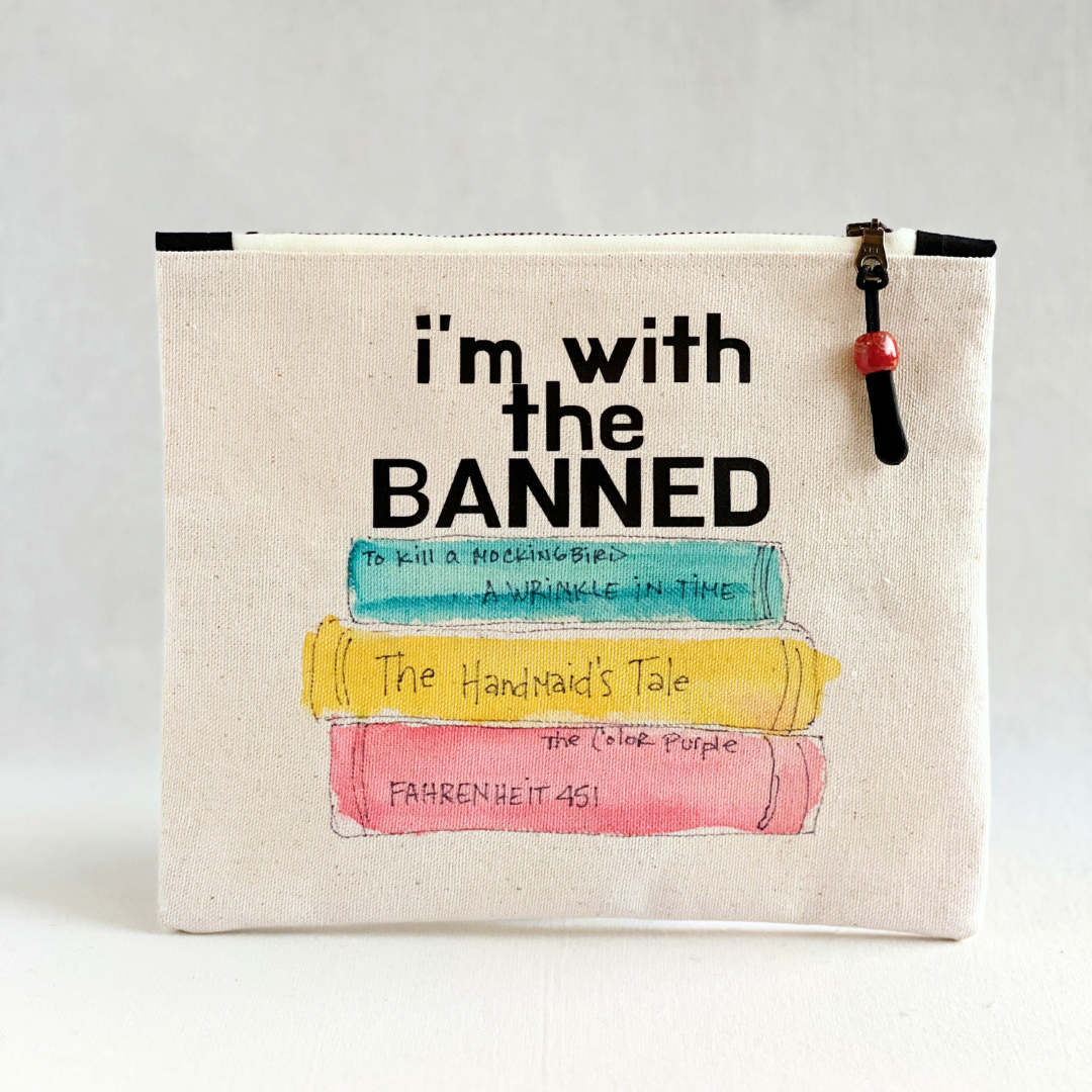 square canvas bag with painted books and the words, I'm with the Banned
