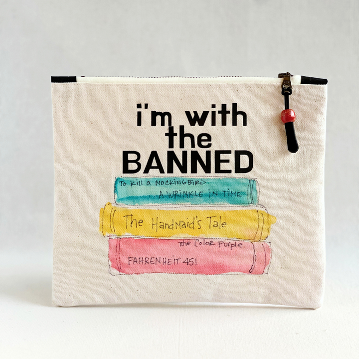 square canvas bag with painted books and the words, I'm with the Banned