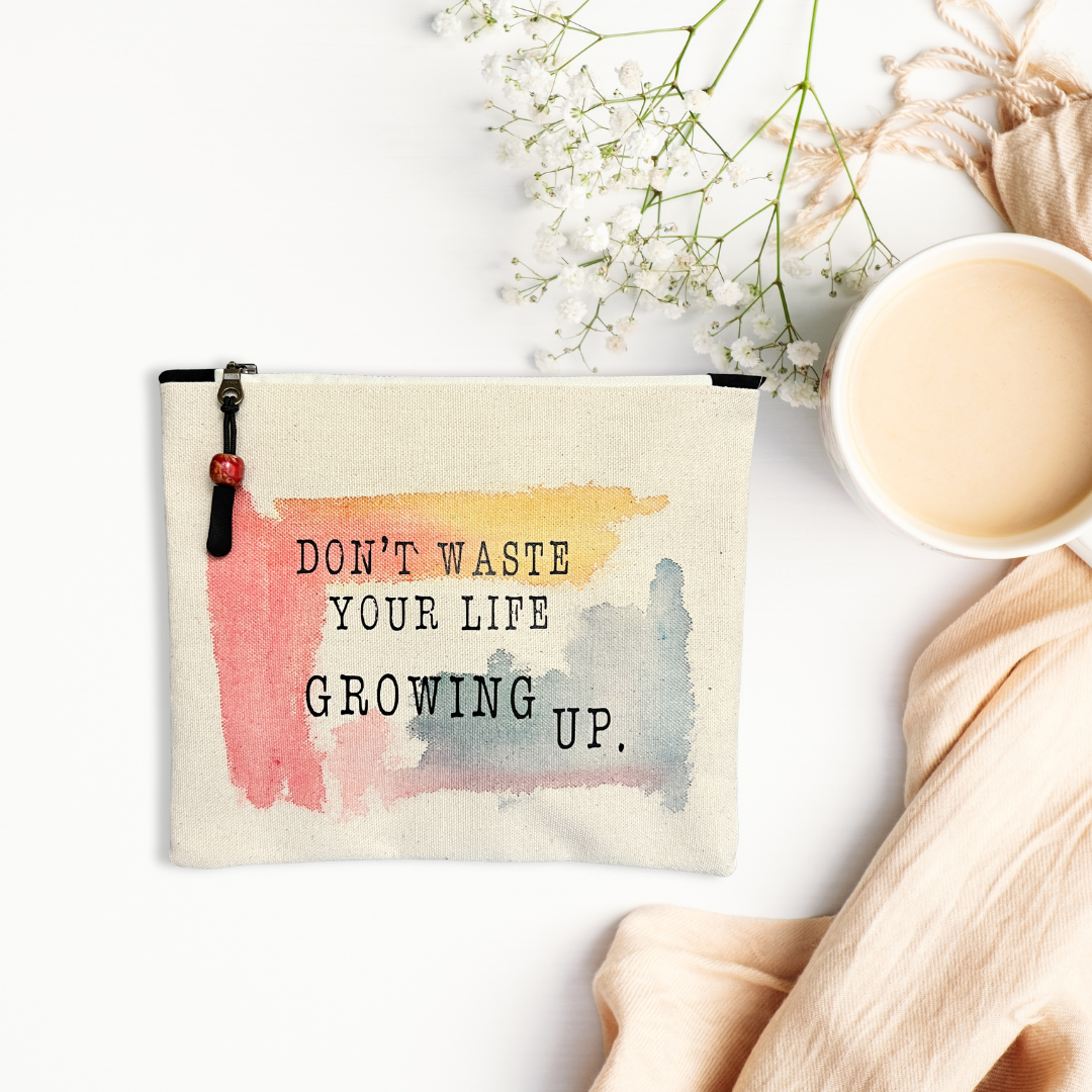 pretty clever words zip pouch bag with paint and the words, don't waste your life growing up.