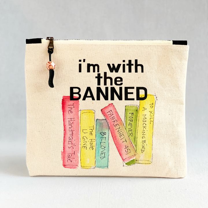 square canvas bag with painted books and the words, I'm with the Banned