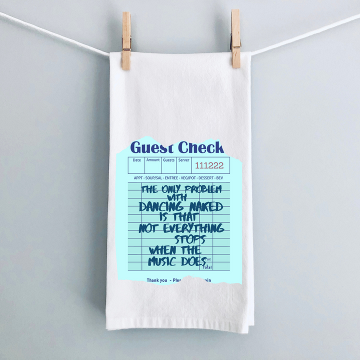 A white kitchen towel with a vintage guest check design in green and the words, The only problem with dancing naked is that not everything stops when the music does.