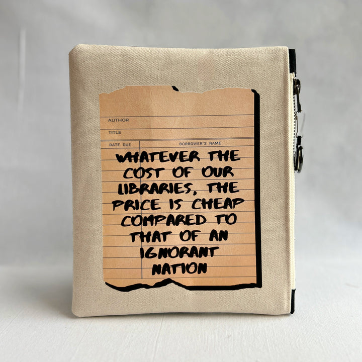 padded canvas zip bag with a linen library card and the words, whatever the cost of our libraries and bookstores, the prices is cheap compared to that of an ignorant nation, plus a colorful zipper pull and lining