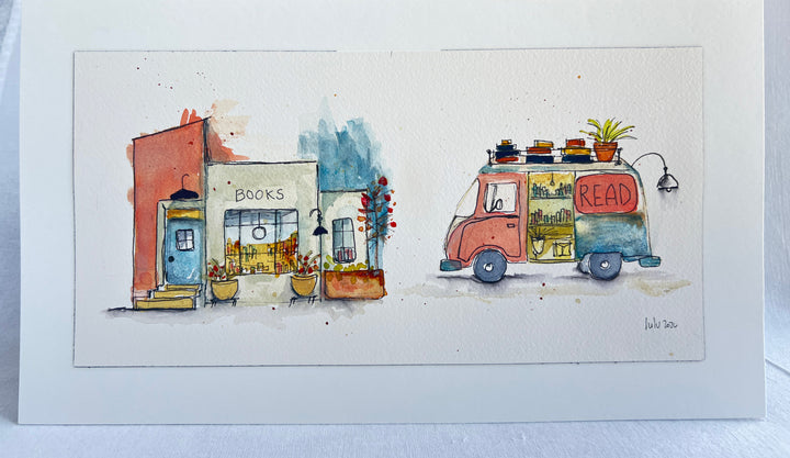 A watercolor art print depicting a cozy bookstore next to a retro van with the word 'READ' on its side, shown as a matted print on a light background.