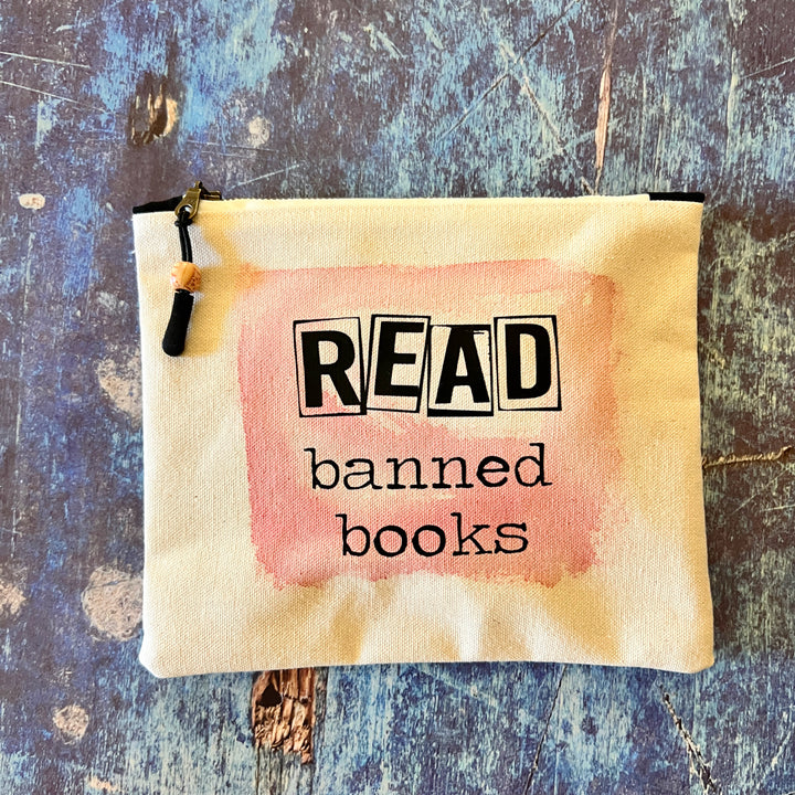 square canvas zipper bag with the words, read banned books