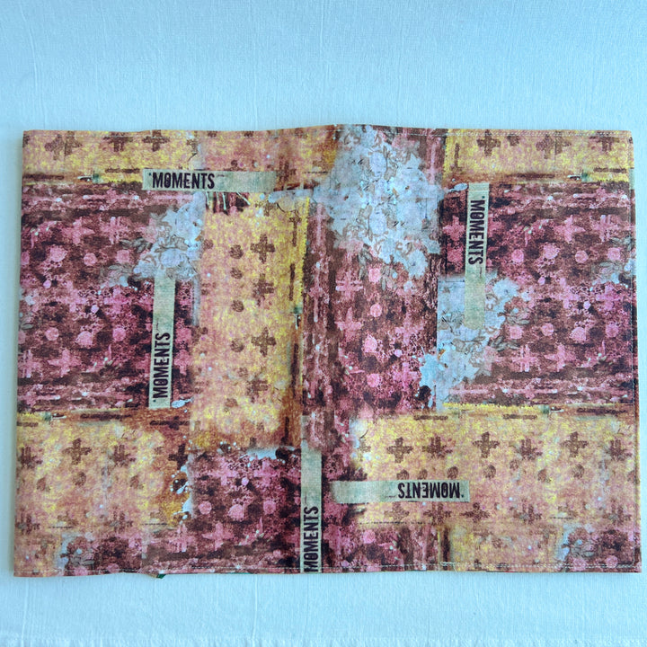 A resuable fabric book cover in multiple colors