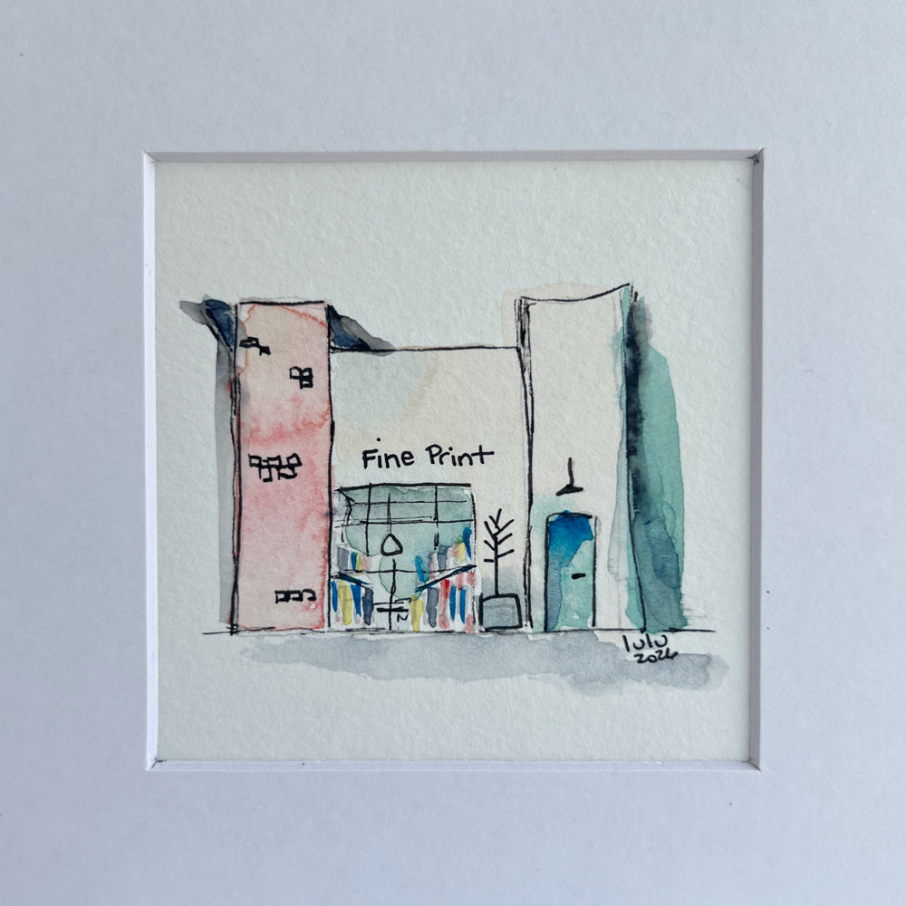 A framed watercolor sketch of a storefront scene with the words 'Fine Print' visible, shown against a light gray background.