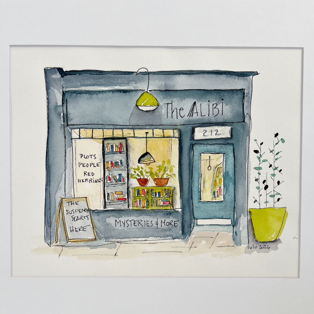 A watercolor art print depicting a cozy bookstore storefront named 'The Alibi', featuring a blue-gray facade, a yellow-green hanging lamp, potted plants, and a chalkboard sign on a white background.