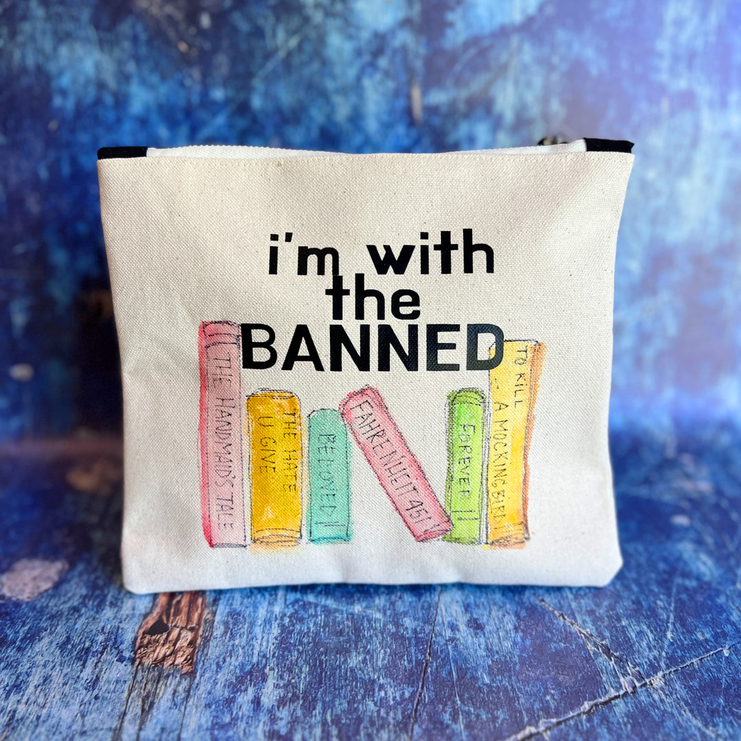 square canvas bag with painted books and the words, I'm with the Banned