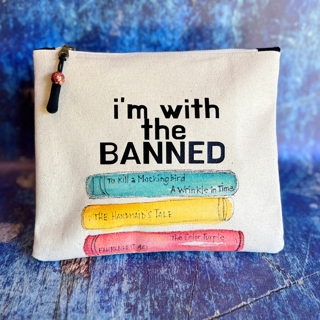 square canvas bag with painted books and the words, I'm with the Banned