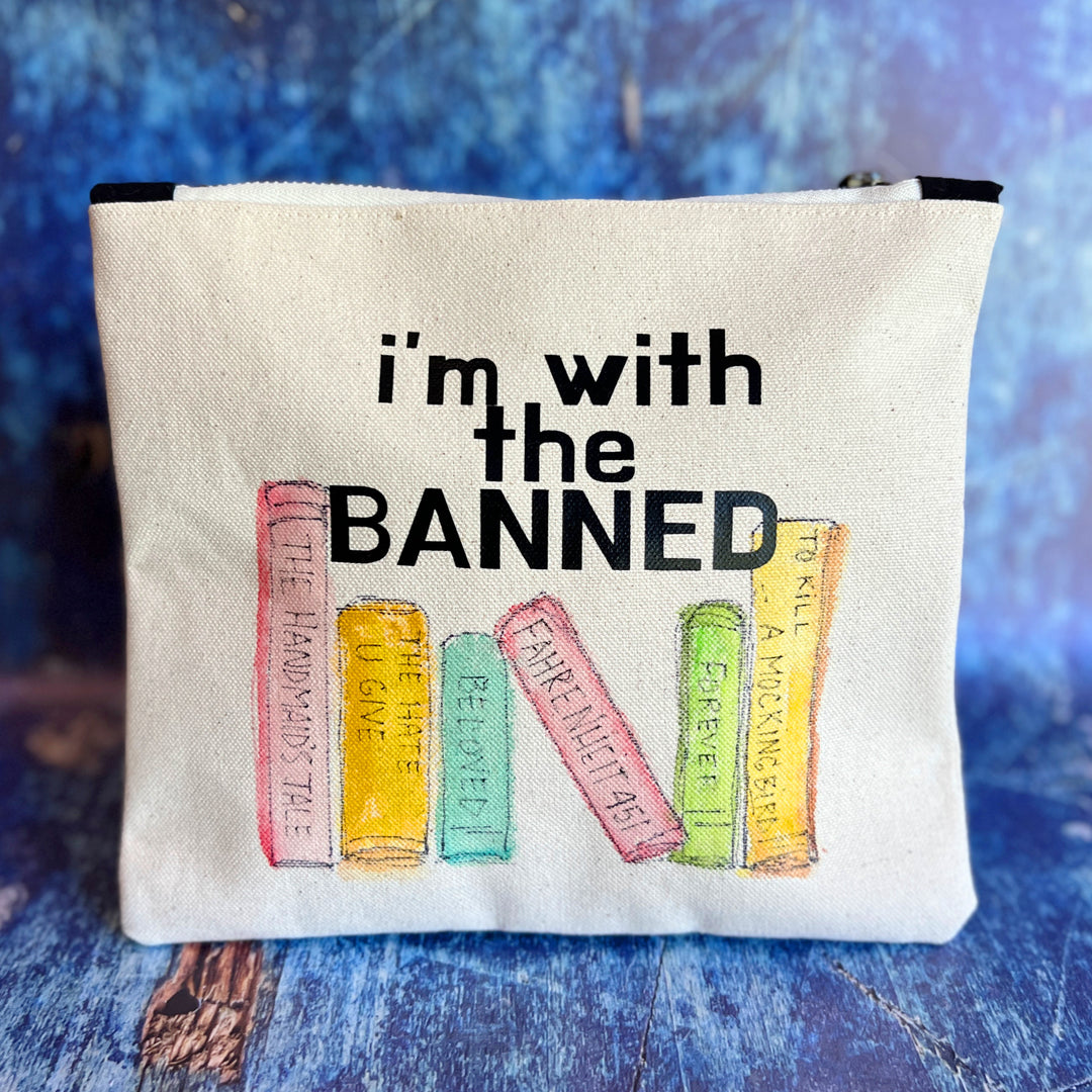 square canvas bag with painted books and the words, I'm with the Banned