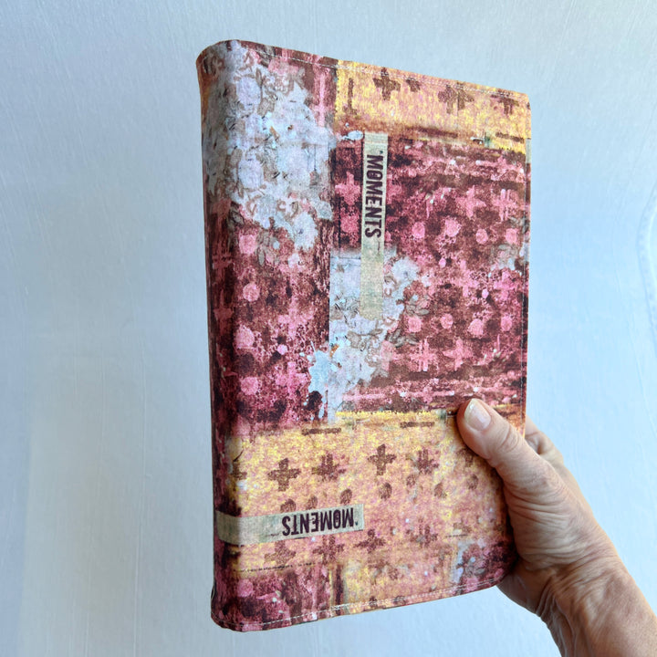 A resuable fabric book cover in multiple colors