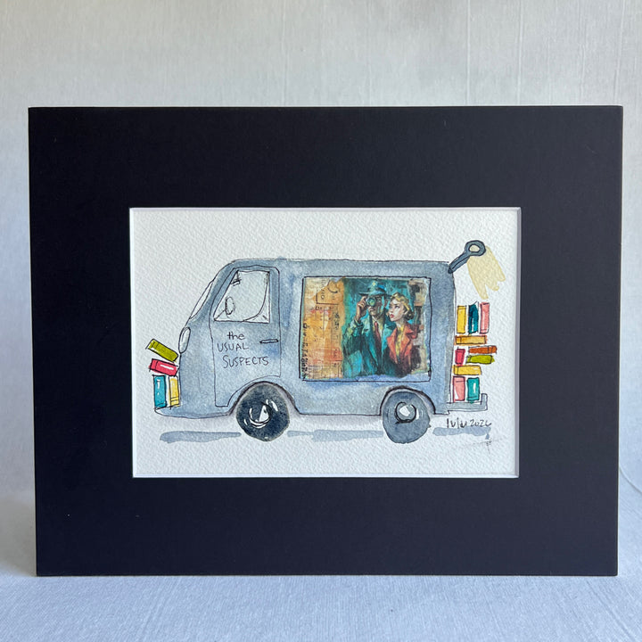 A matted watercolor painting of a grey-blue book truck named "The Usual Suspects" with books and a colorful window illustration, of a couple gazing mysteriously into the distance.