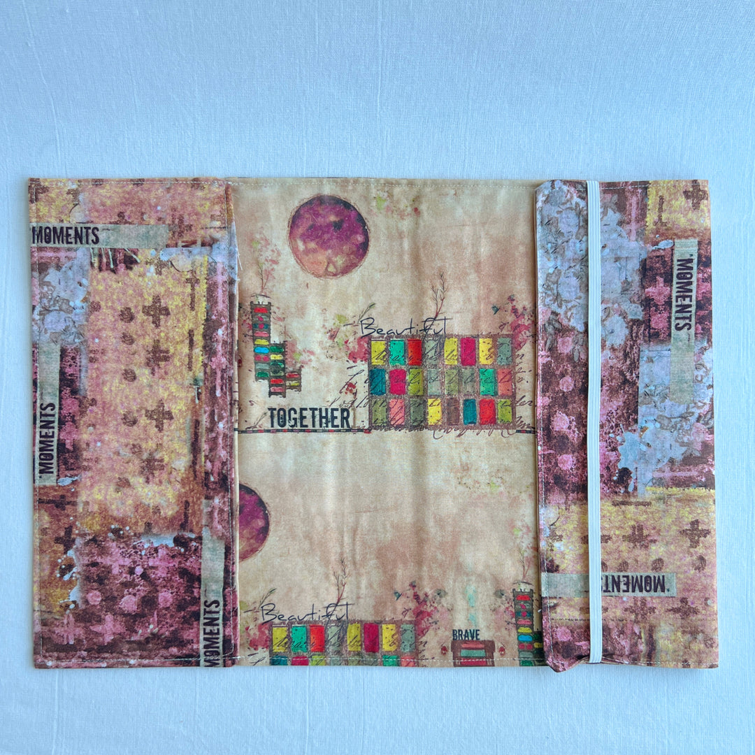 A resuable fabric book cover in multiple colors