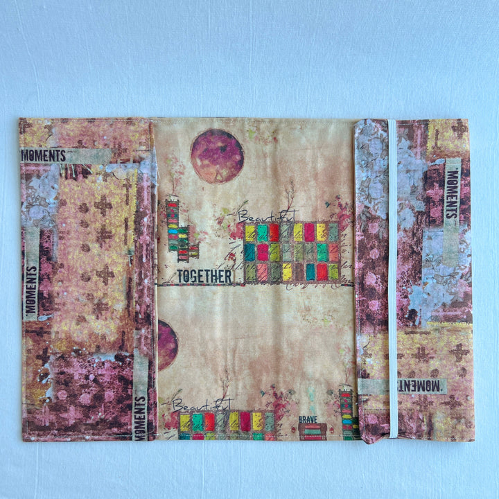 A resuable fabric book cover in multiple colors