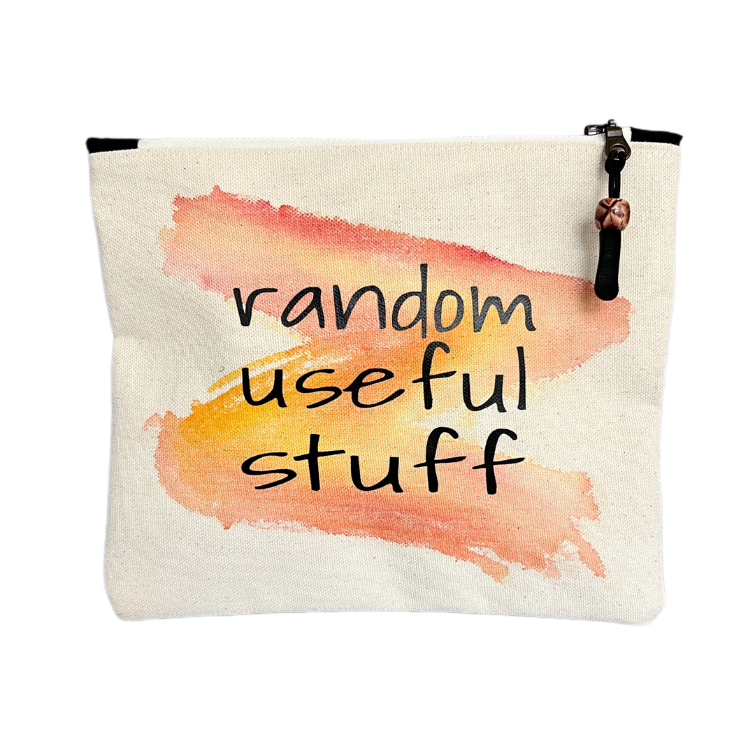 square canvas zipper pull bag with the words, random useful stuff
