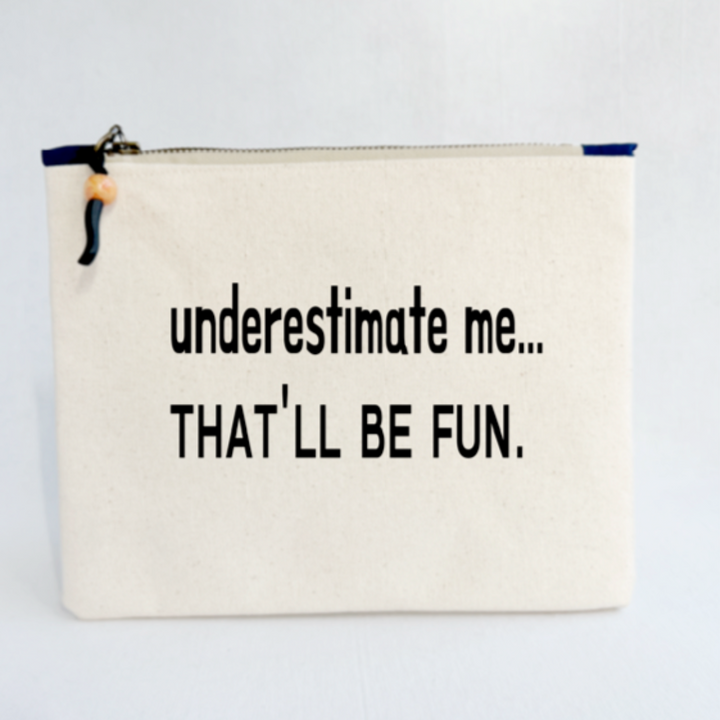 square canvas zipper bag with paint and the words, "underestimate me..that'll be fun.