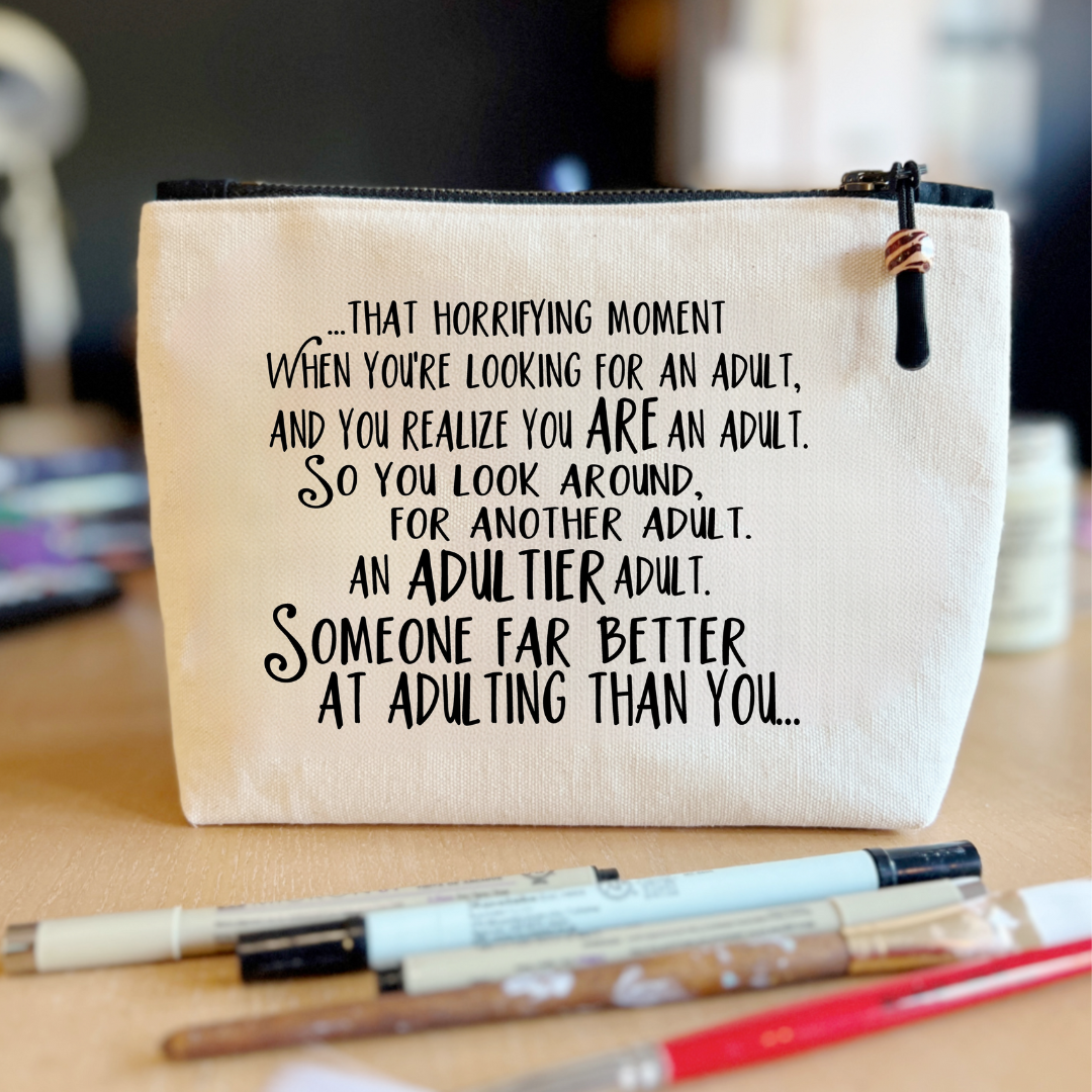 square canvas zip bag with black zipper and the words, that horrifying moment when you realize that you are the adult in the room