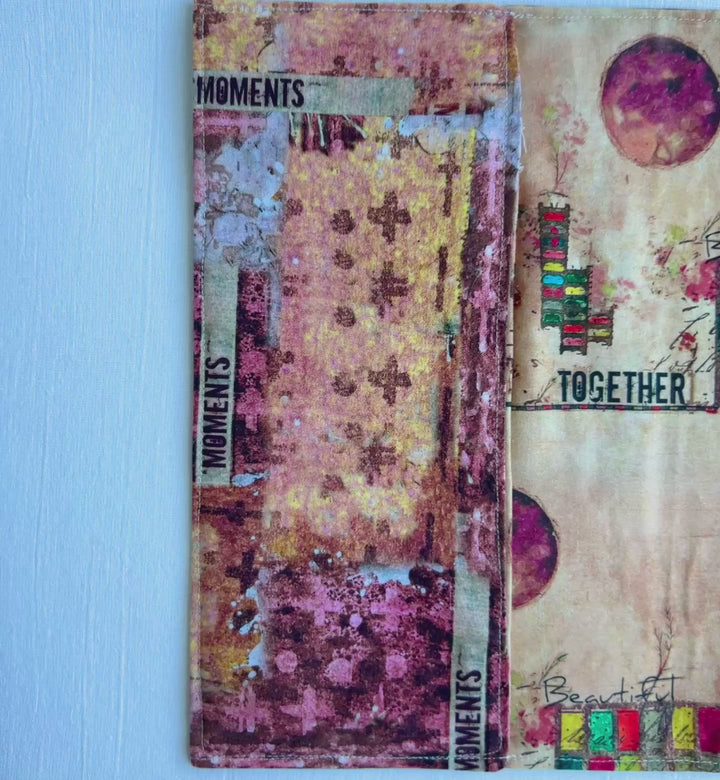 A resuable fabric book cover in multiple colors