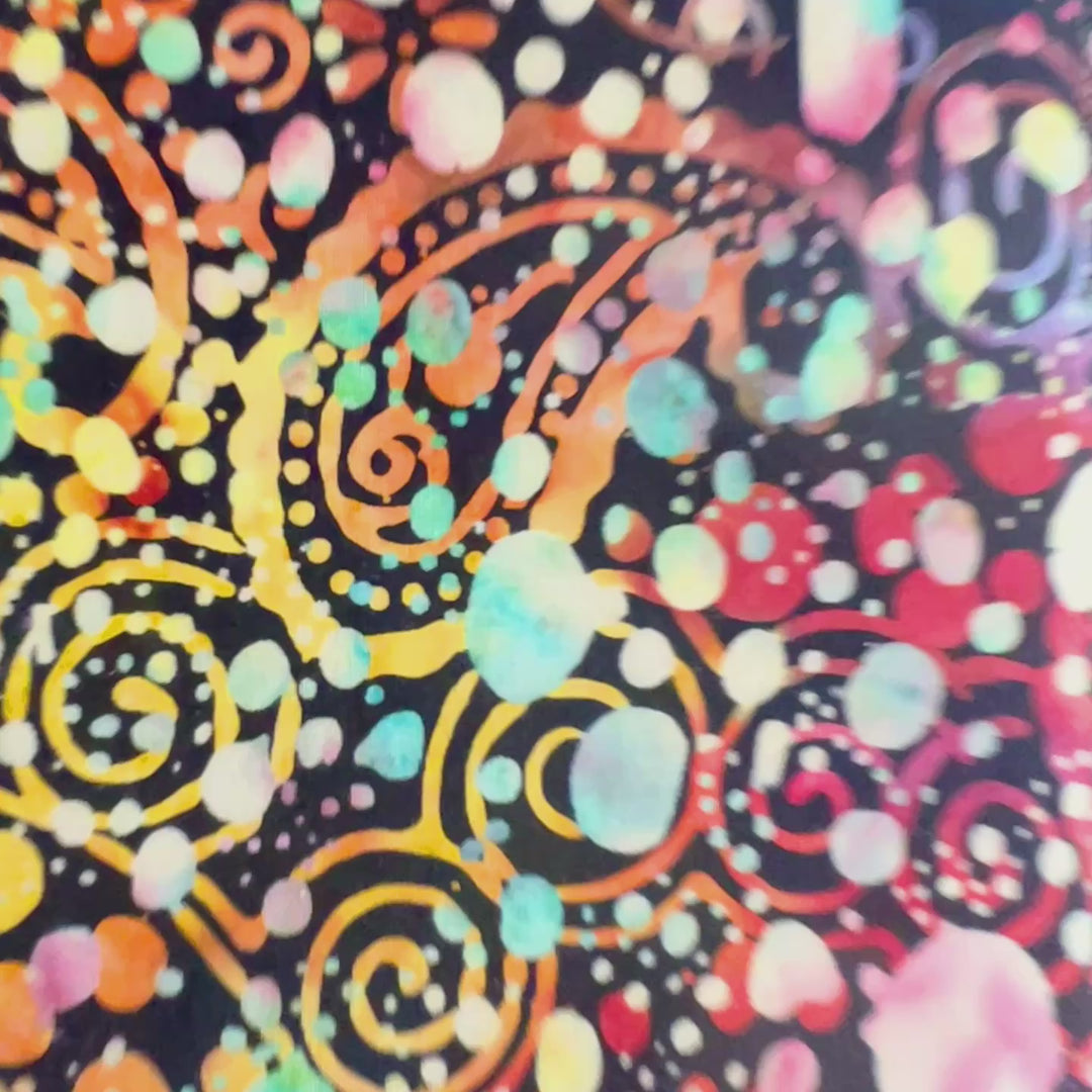 rectangular fabric book cover with rich paisley multicolored splatters and colors