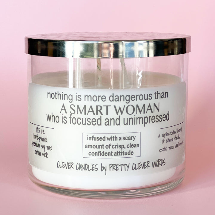 nothing is more dangerous than a smart woman - grey sophistication candle