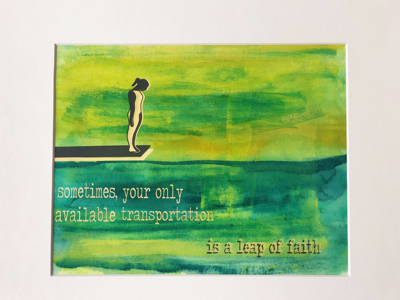 painted fabric art piece in green and blue paint, with a person on a diving board, and the words, "sometimes your only available transportation is a leap of faith