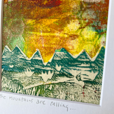 the mountains are calling in this original pretty clever fabric art print with yellows, greens and reds