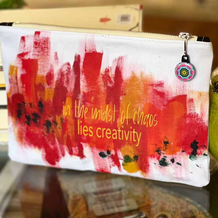 in the midst of chaos lies creativity - canvas art zip bag