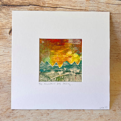 the mountains are calling in this original pretty clever fabric art print with yellows, greens and reds