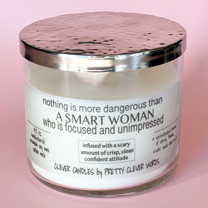 nothing is more dangerous than a smart woman - grey sophistication candle
