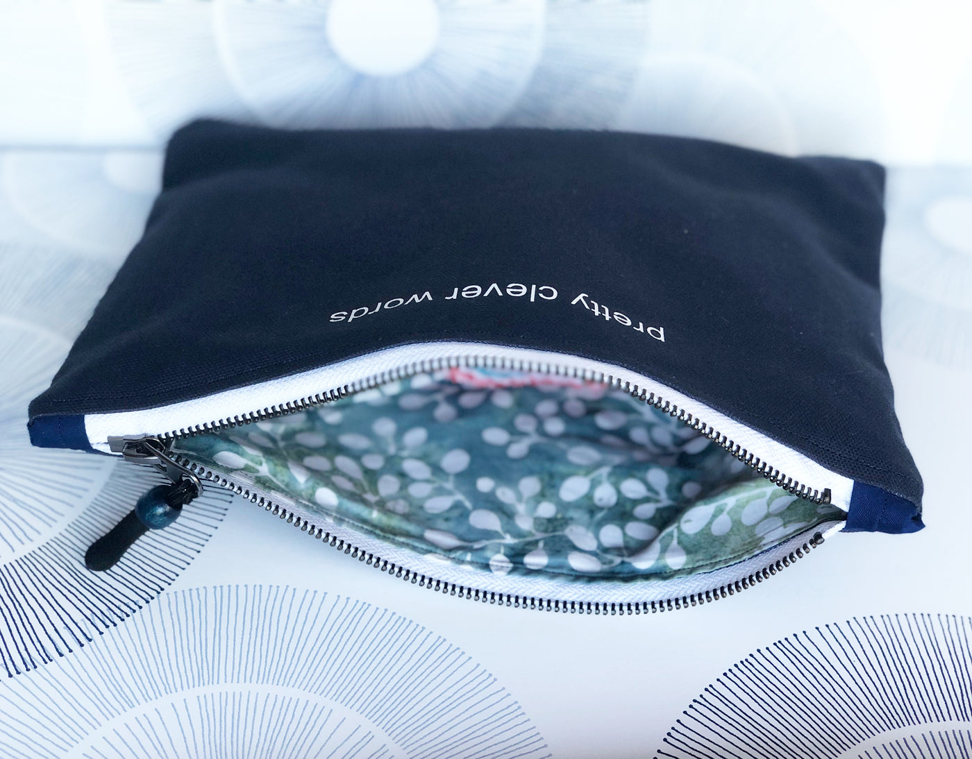 i am the storm in black - zip money makeup bag