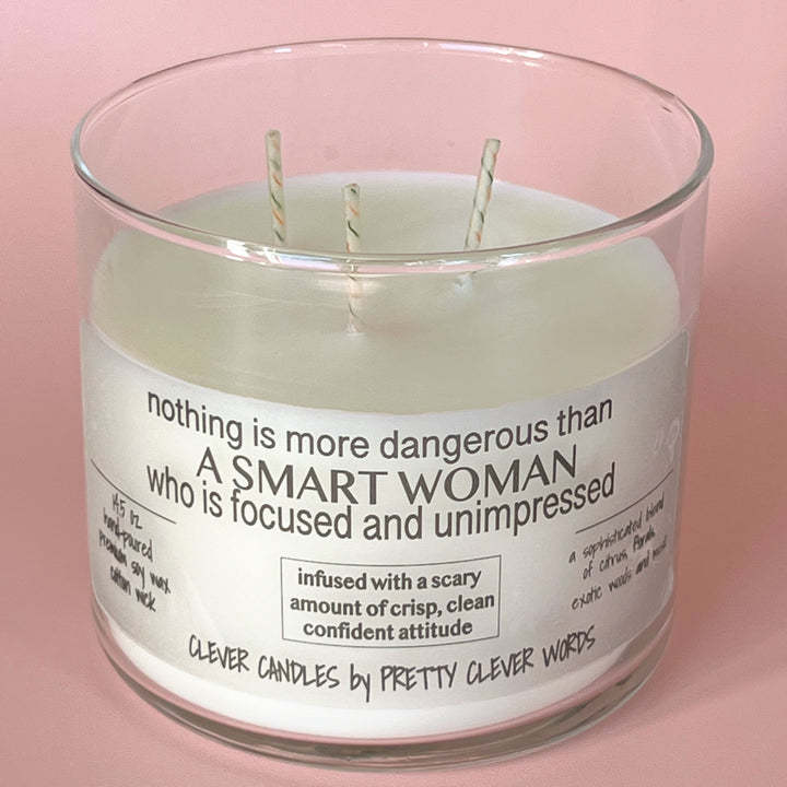 nothing is more dangerous than a smart woman - grey sophistication candle