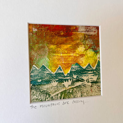 the mountains are calling in this original pretty clever fabric art print with yellows, greens and reds