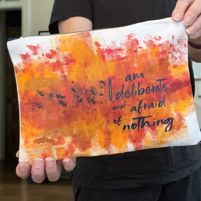 i am deliberate and afraid of nothing - canvas art zip bag