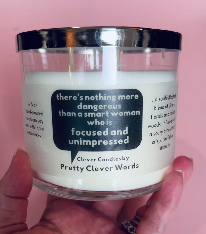 nothing is more dangerous than a smart woman, said in a word bubble - grey sophistication candle