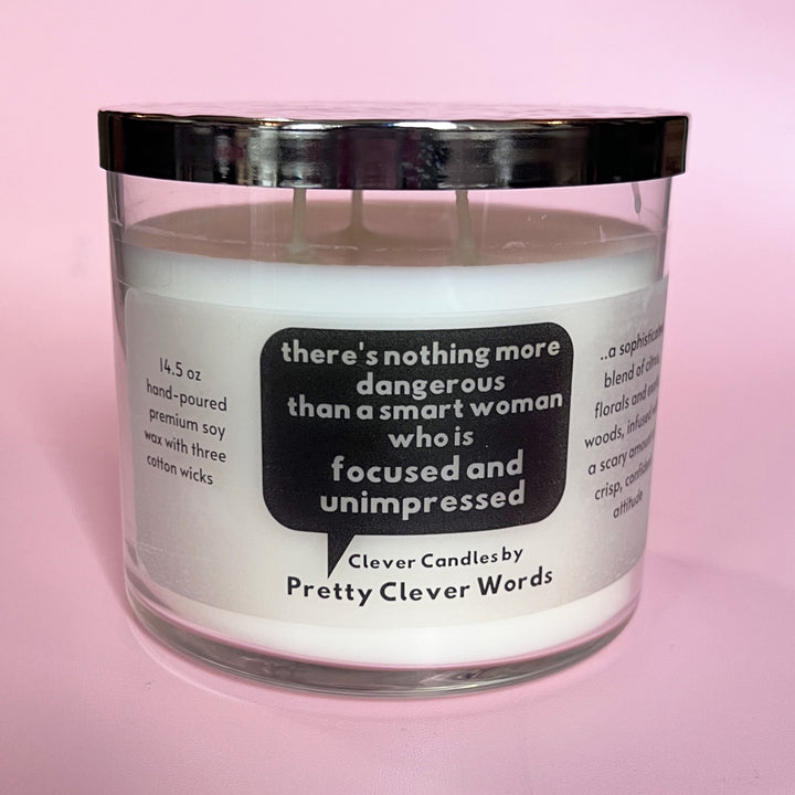 nothing is more dangerous than a smart woman, said in a word bubble - grey sophistication candle