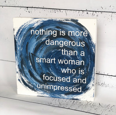 nothing is more dangerous than a smart woman - wood panel art