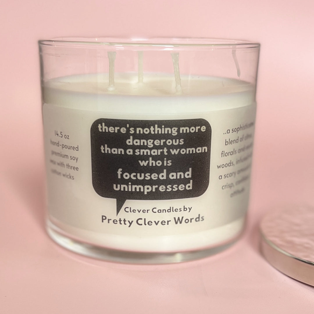 nothing is more dangerous than a smart woman, said in a word bubble - grey sophistication candle