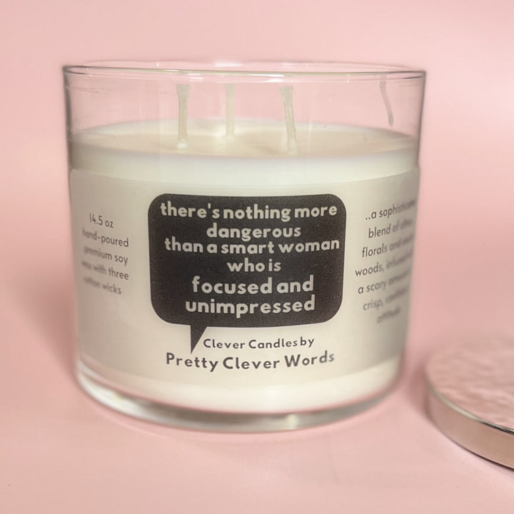 nothing is more dangerous than a smart woman, said in a word bubble - grey sophistication candle