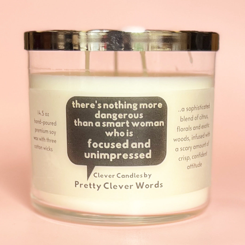 nothing is more dangerous than a smart woman, said in a word bubble - grey sophistication candle