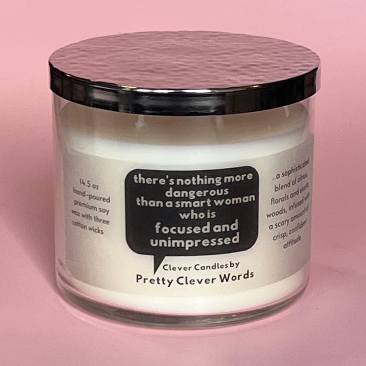 nothing is more dangerous than a smart woman, said in a word bubble - grey sophistication candle